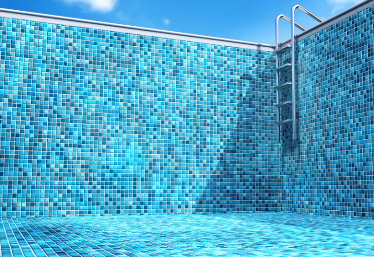 Bright blue pool liner in empty pool