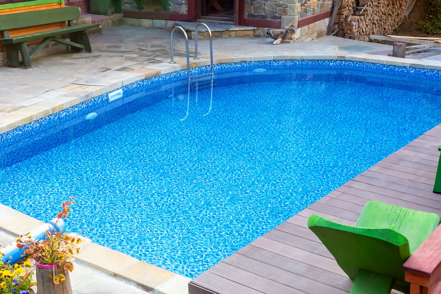 Clear blue pool in the yard.