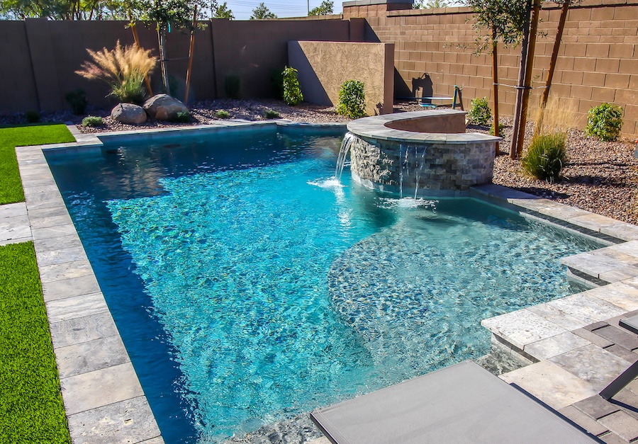 Landscaped Rear Yard Swimming Pool With Waterfall