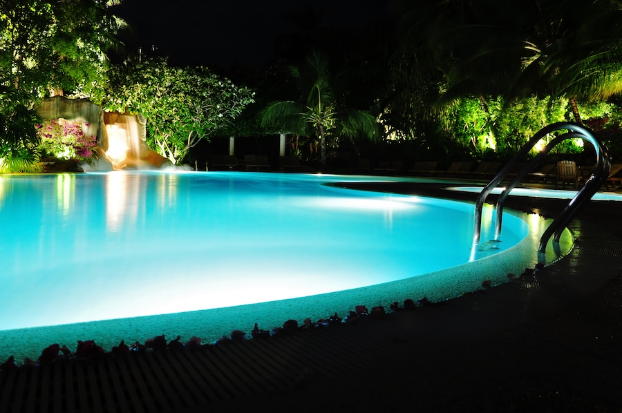 blue swimming pool at night