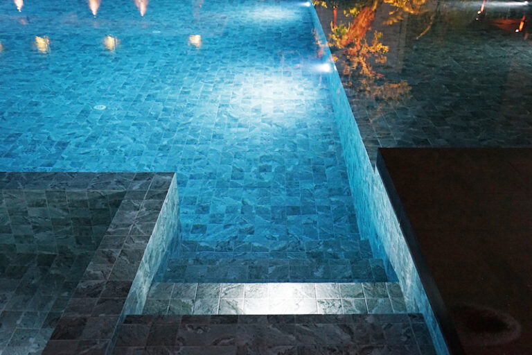 Pool well-lit at night