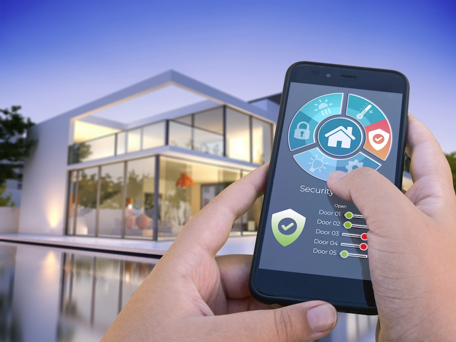 hand controlling the pool and home via iohone