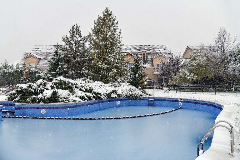 Snow covered yard in a beautiful neigborhood