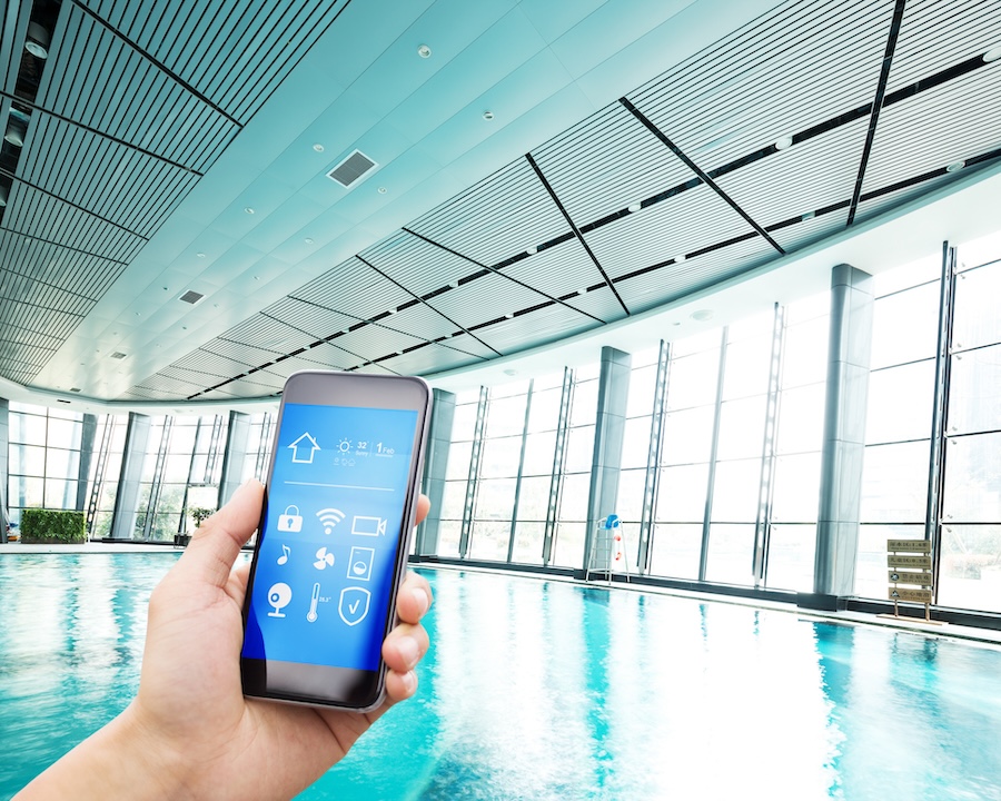 smart phone with smart home and swimming pool in modern gym